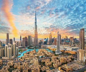 Dubai optimal weather conditions peak season low-cost flights fare comparison tools price alerts alternative airports budget-friendly travel Dubai travel guide travel planning