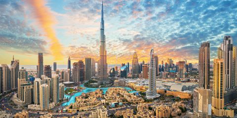 Dubai optimal weather conditions peak season low-cost flights fare comparison tools price alerts alternative airports budget-friendly travel Dubai travel guide travel planning